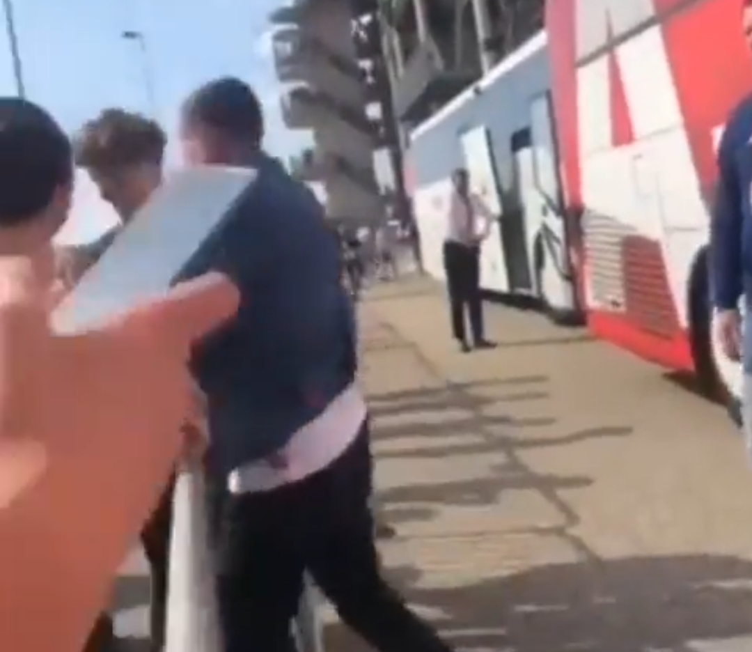 Video: Ajax midfielder appears to punch fan after he yelled a racist slur at teammate Brian Brobbey CaughtOffside
