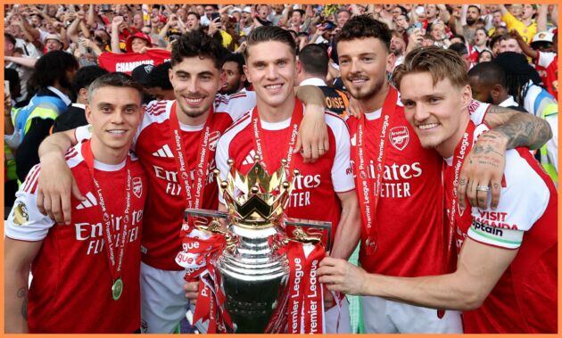 Arsenal players with the Premier League trophy