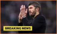 Michael Carrick and breaking news banner